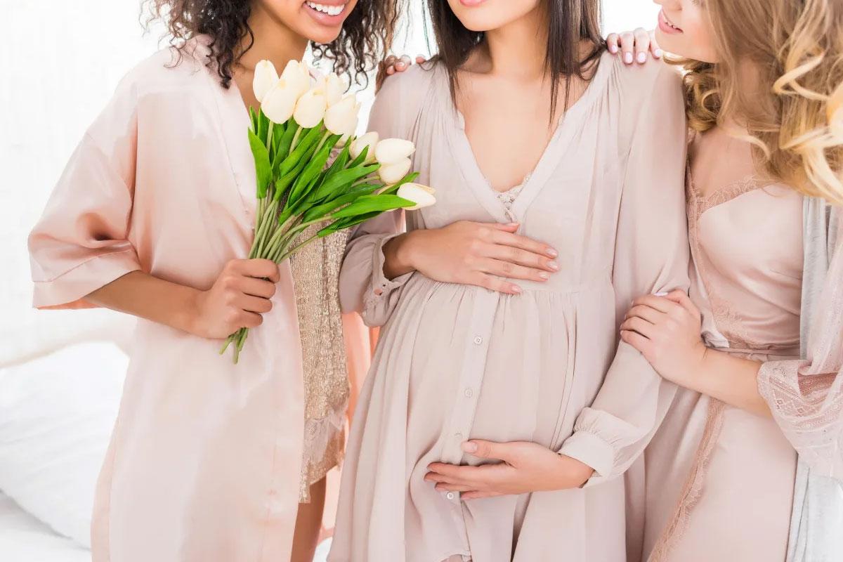 A pregnant lady with her friends at a baby shower at the Royal Regency Hotel in Yonkers, NY