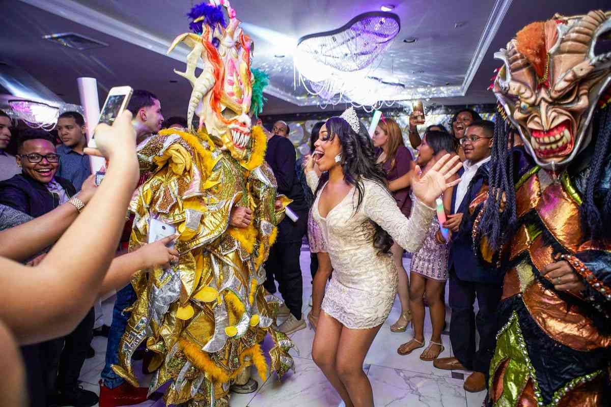 Guest in elegant attire posing on decorated ballroom in Yonkers, NY