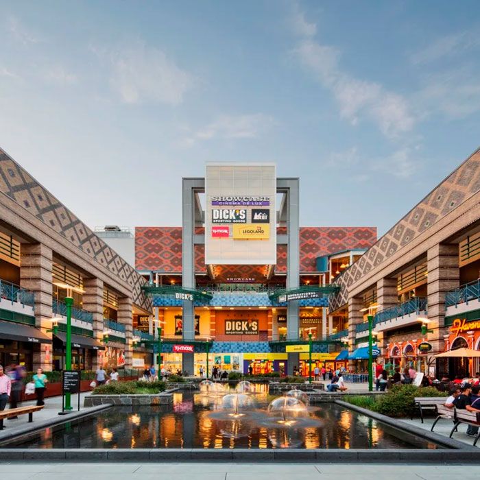 Westchester’s Ridge Hill outdoor mall with a fountain and retail stores