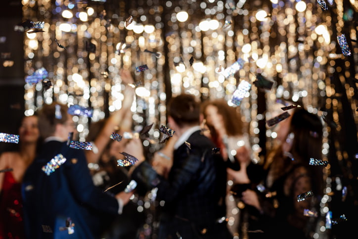 Prom night celebration with formally dressed people and shimmering decorations in Yonkers, NY